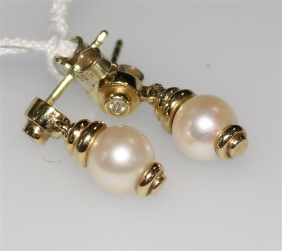 A pair of 14ct gold, cultured pearl and diamond ear studs.